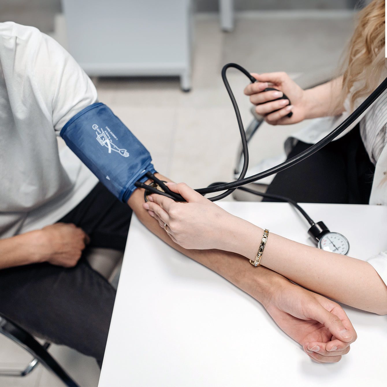 Blood pressure being measured with a cuff