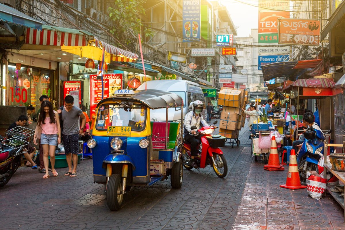 A tuk-tuk on a busy street in Bangkok, Thailand